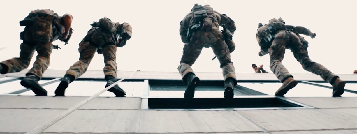 Special Forces operators executing rooftop breach — Team SOFAST training doctrine